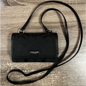 COACH Small Cross Body.  Black In color